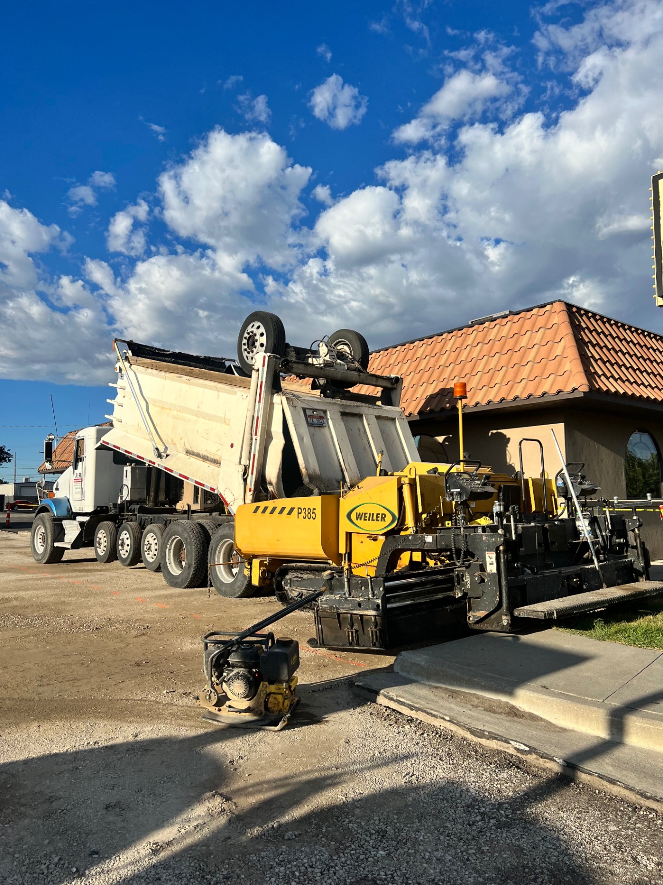 Weiler P385 paver at a restaurant job site